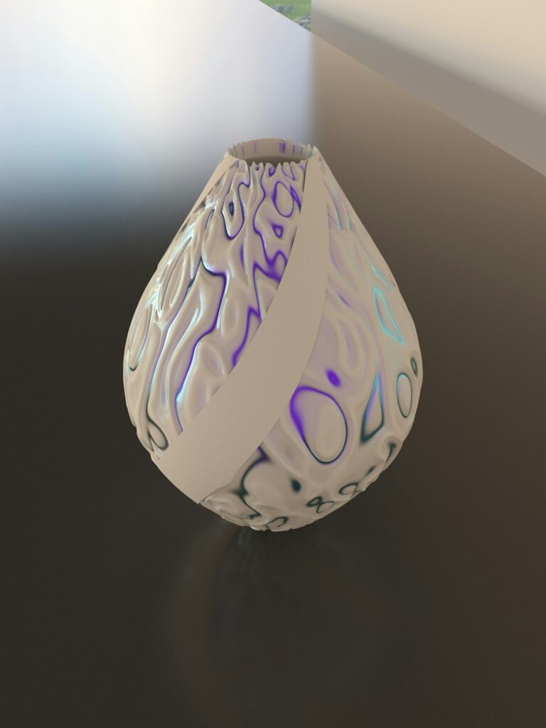 a white vase sitting on top of a table